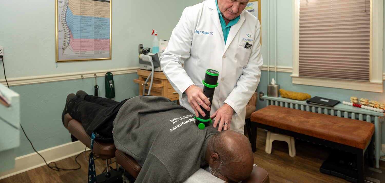 Dr Gary Harcourt treating a patient at Harcourt Chiropractic